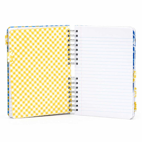 An open spiral-bound notebook with a yellow and white gingham patterned cover on the left and lined white pages on the right, shown on a clean white background.