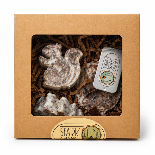 Box of fire starters shaped like animals with a 'Spark Change' label on a white background