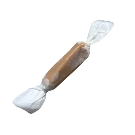 One single, individually wrapped caramel