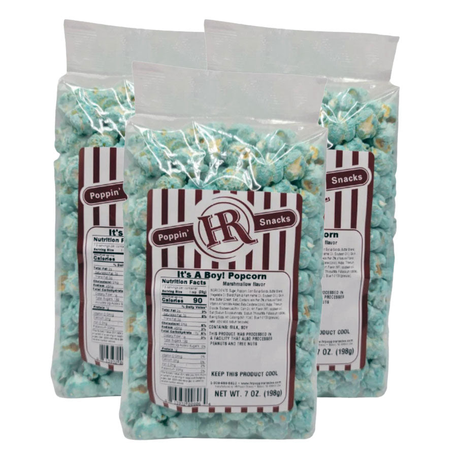 Three bags of blue popcorn with visible labels on a white background