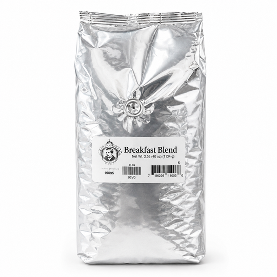 Silver bag of coffee labeled 'Breakfast Blend' on a white background