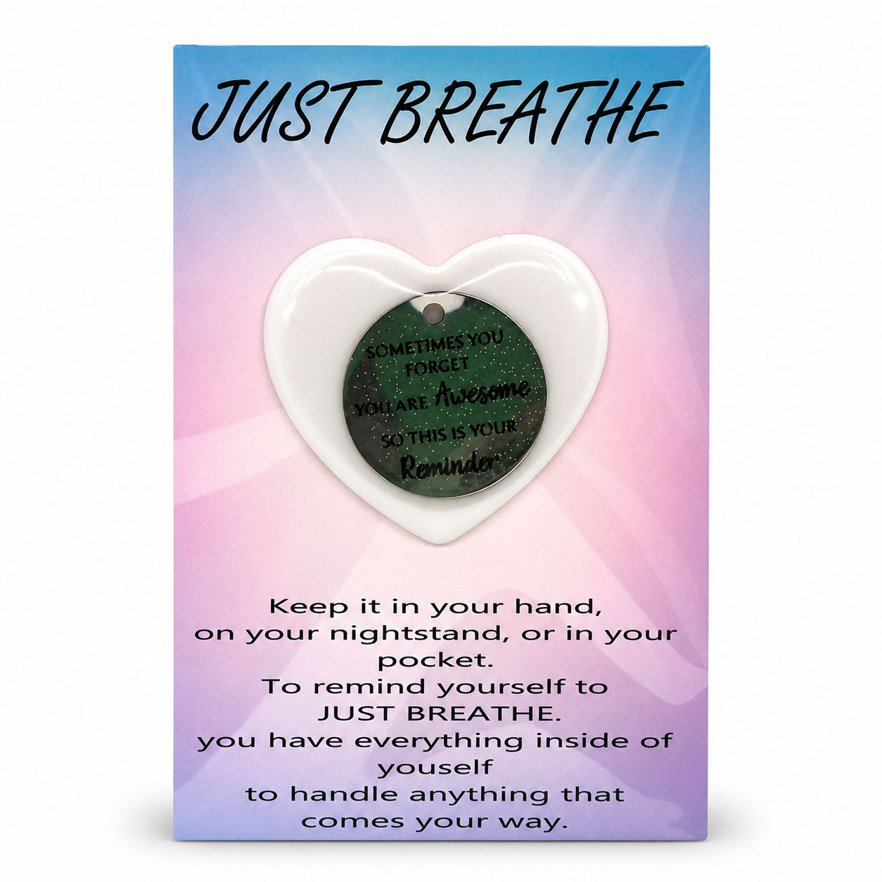 Heart-shaped pendant with motivational message on a colorful card