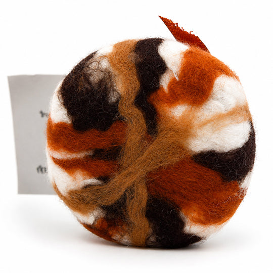 Multicolored yarn ball with a label on a white background