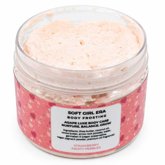 Jar of Soft Girl Era body frosting with a pink and white label on a white background