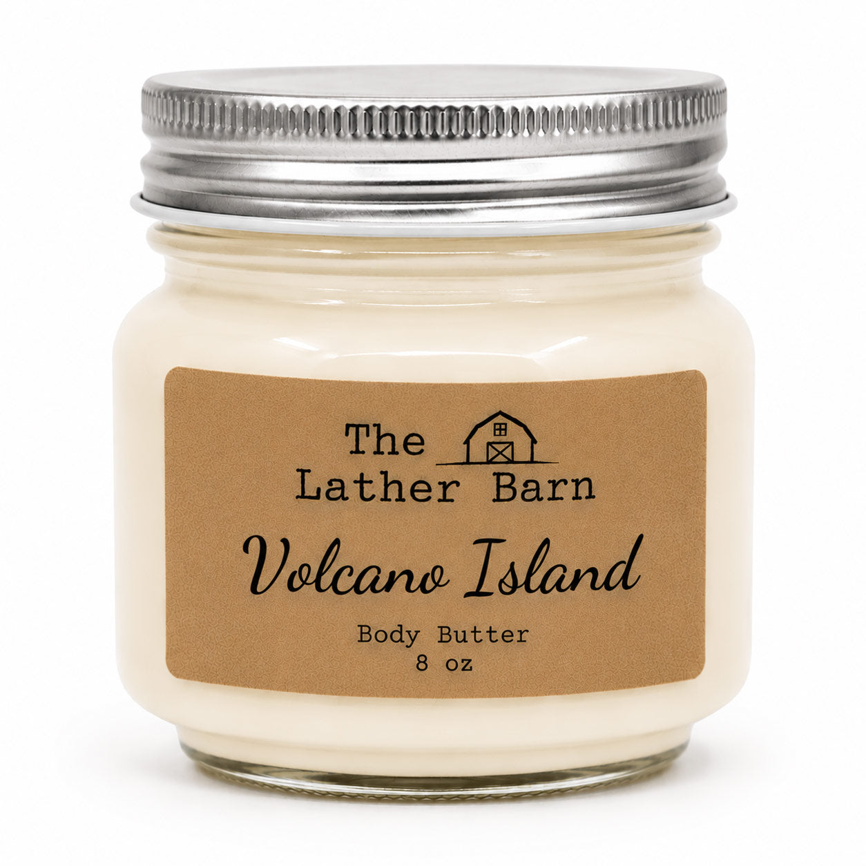 An 8 oz jar candle of body butter by The Lather Barn, featuring creamy off-white wax in a clear glass jar with a silver metal lid and a brown kraft paper label.