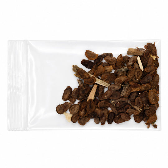 Small pile of dried brown seeds in a clear plastic bag on a white background