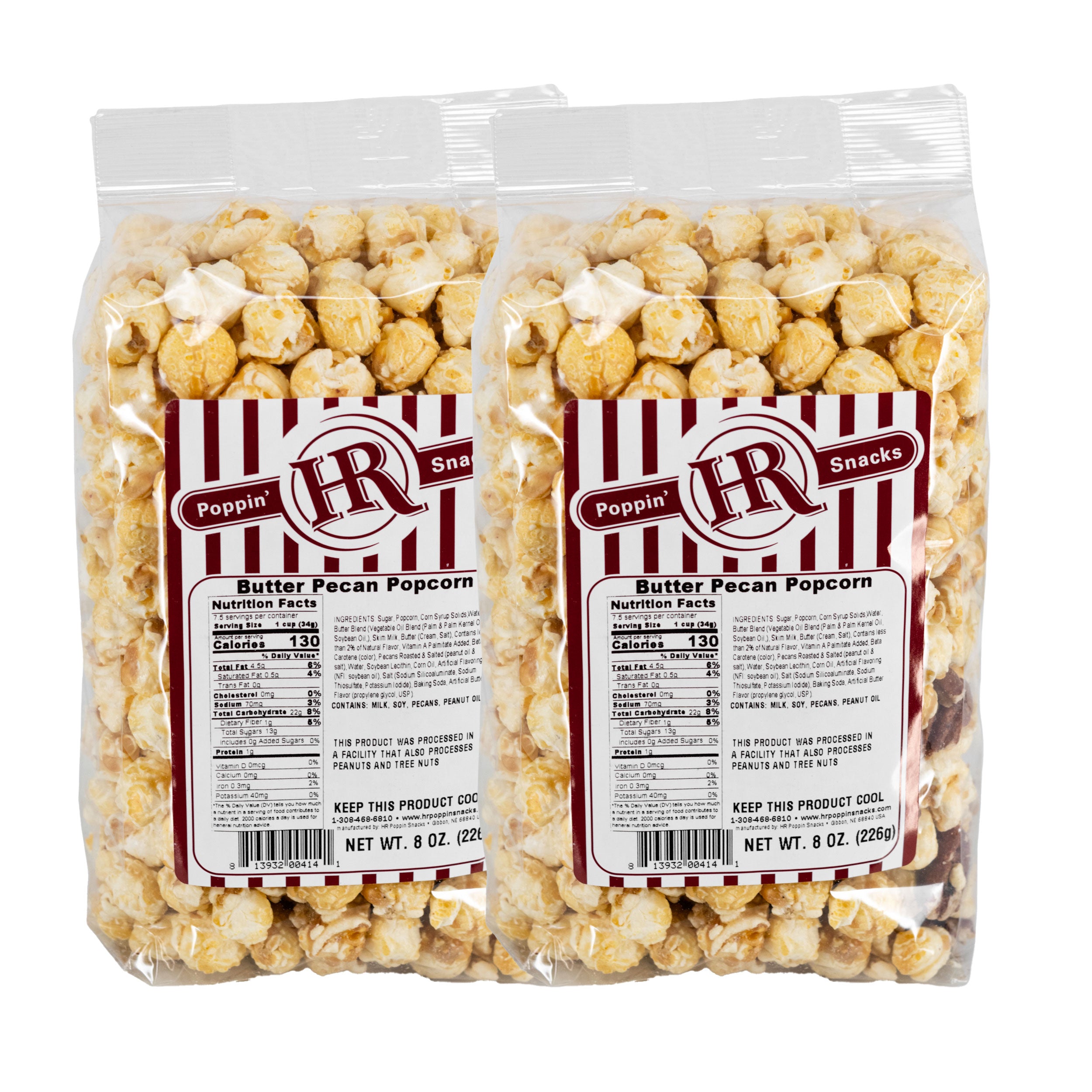 Two packages of Butter Pecan Popcorn with a visible brand label on a white background.