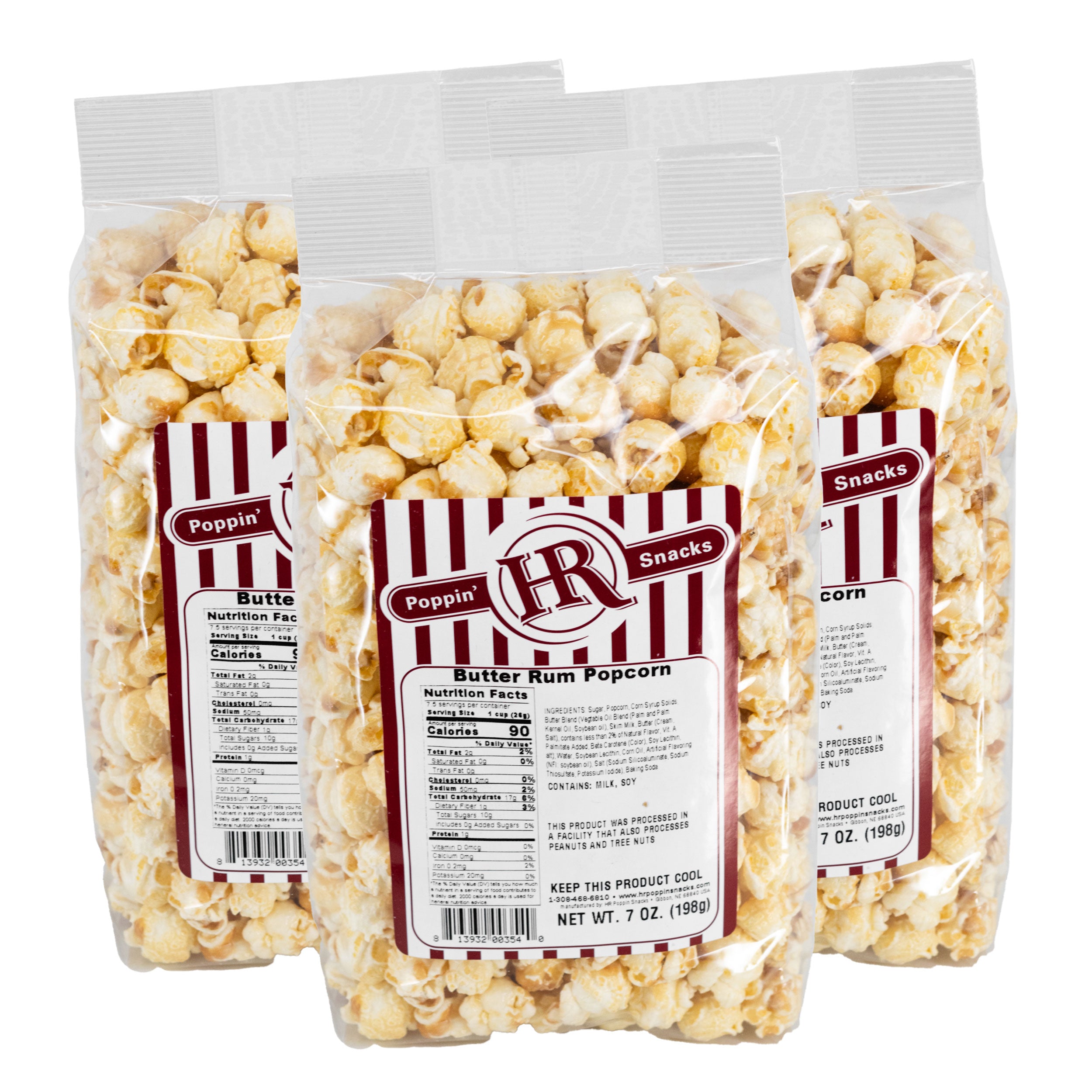 Three bags of HR Poppin' Snacks Butter Rum Popcorn with visible labels on a white background