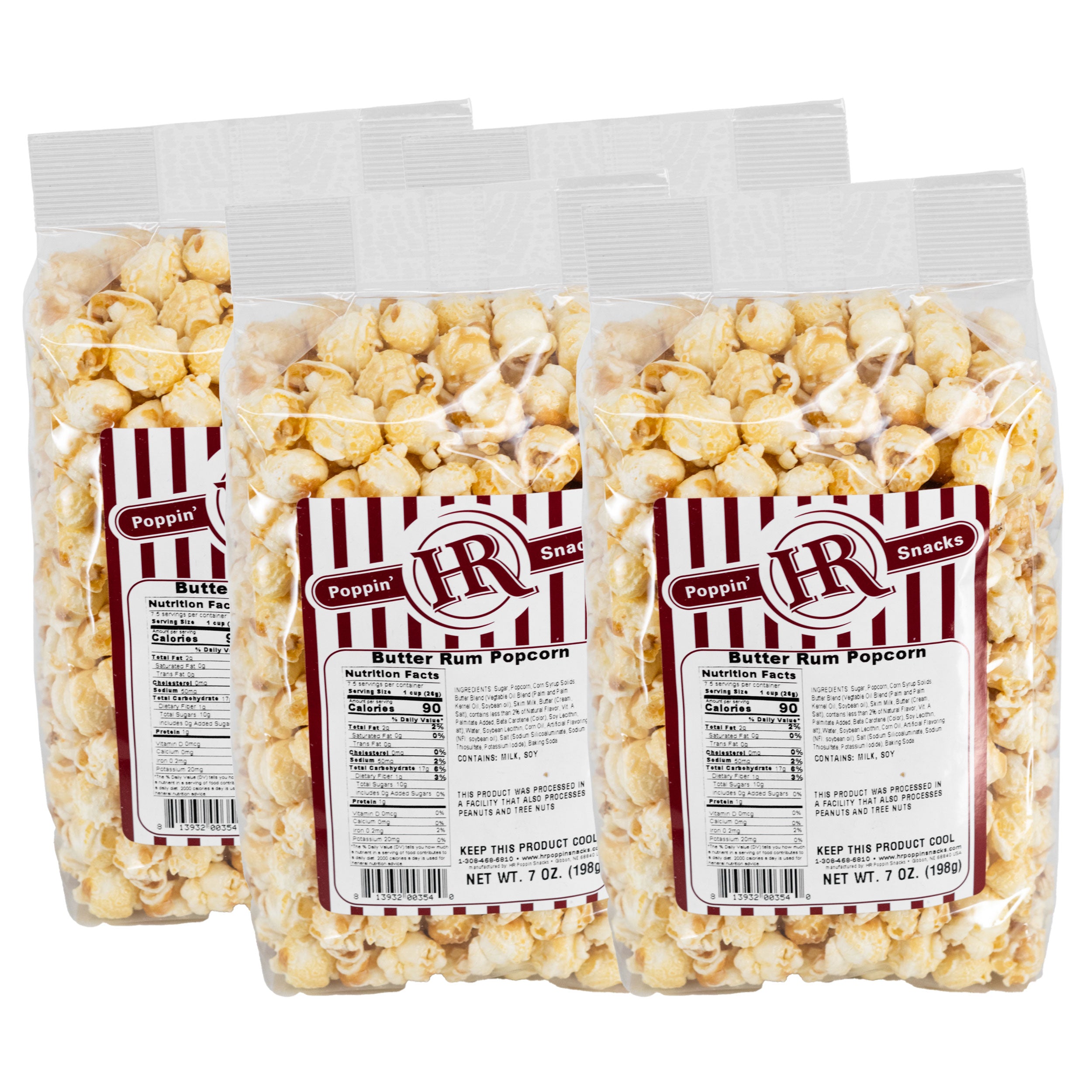 Four bags of Butter Rum Popcorn with visible labels on a white background