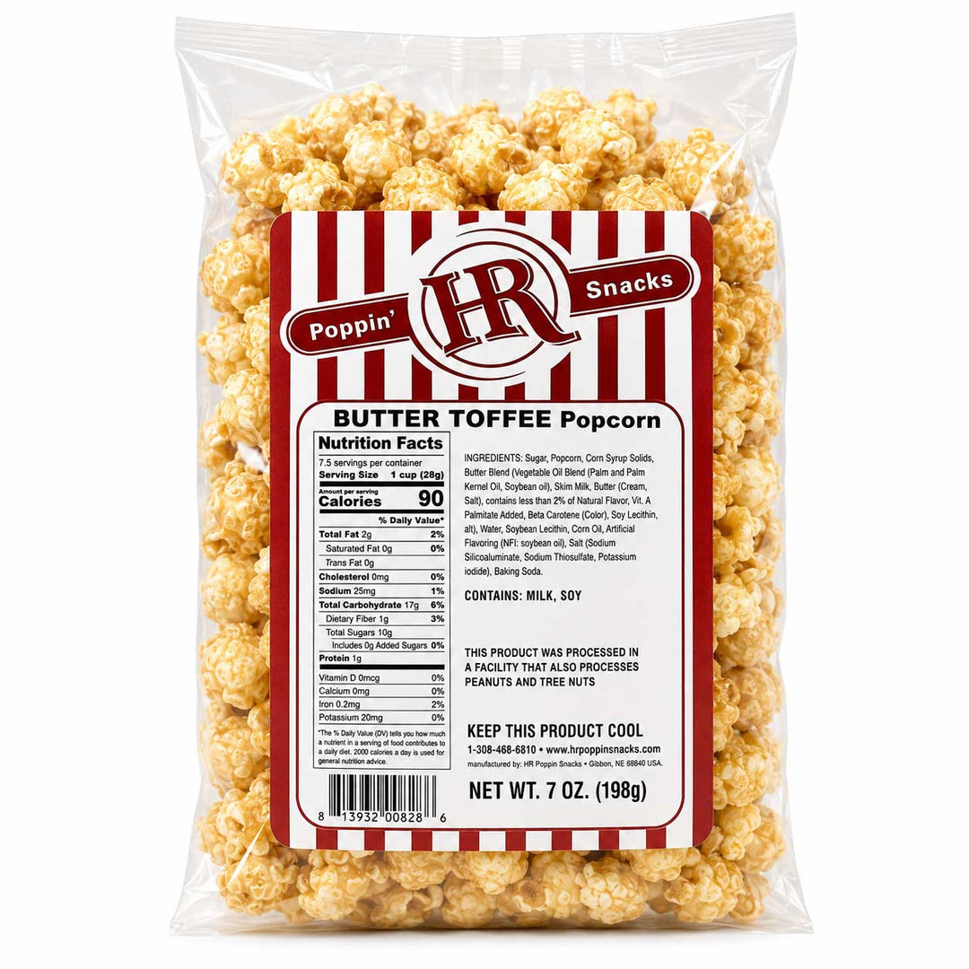 A 7 oz bag of Poppin' Butter Tofee Popcorn on a clean white background. The clear plastic bag shows the golden-yellow popcorn inside, with a prominent red and white striped label displaying the brand 'Poppin' H&R' and product details.