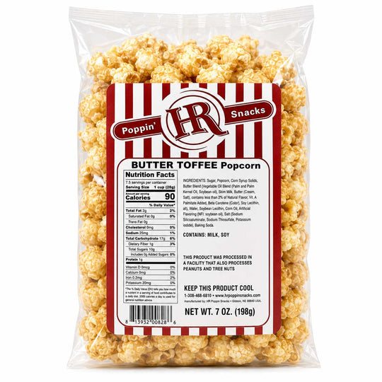 A 7 oz bag of Poppin' Butter Tofee Popcorn on a clean white background. The clear plastic bag shows the golden-yellow popcorn inside, with a prominent red and white striped label displaying the brand 'Poppin' H&R' and product details.