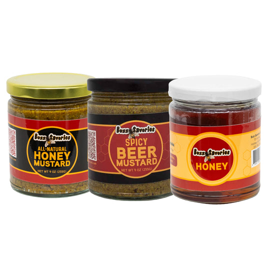 Three jars of Buzz's Savories mustard and honey on a white background