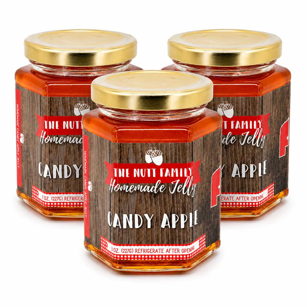 Three jars of 'Candy Apple' jelly with wooden design labels on a white background