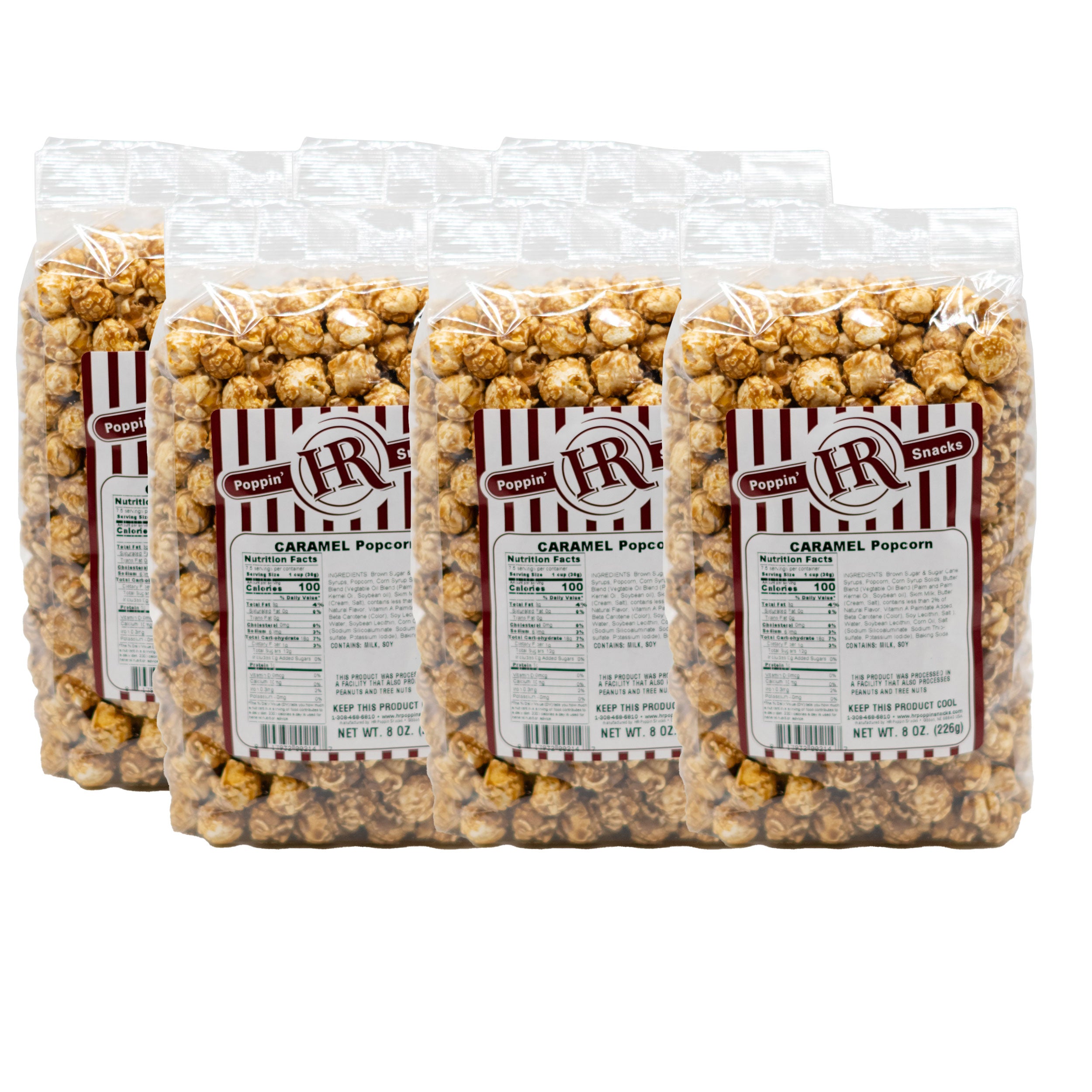 Six packages of caramel popcorn with visible branding on a white background