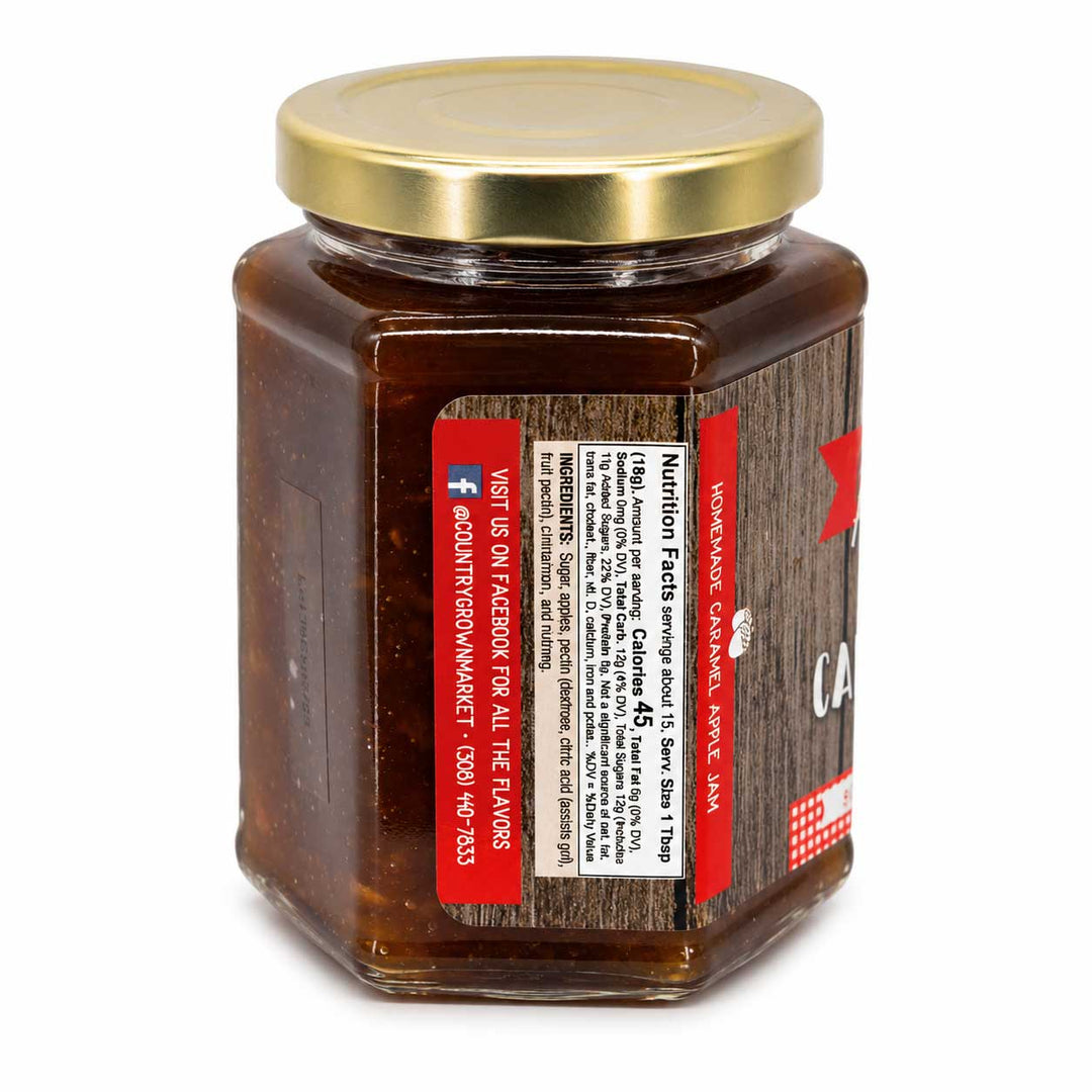 Jar of honey with a gold lid on a white background
