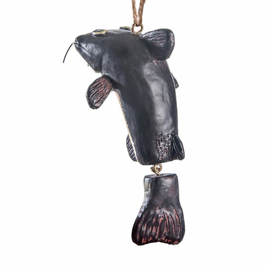 Black catfish ornament on a white background