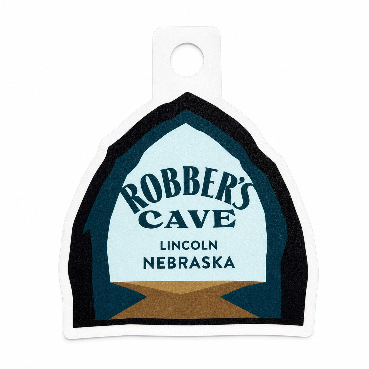 A die-cut sticker featuring the logo for Robber's Cave Lincoln Nebraska, displayed on a clean white background.