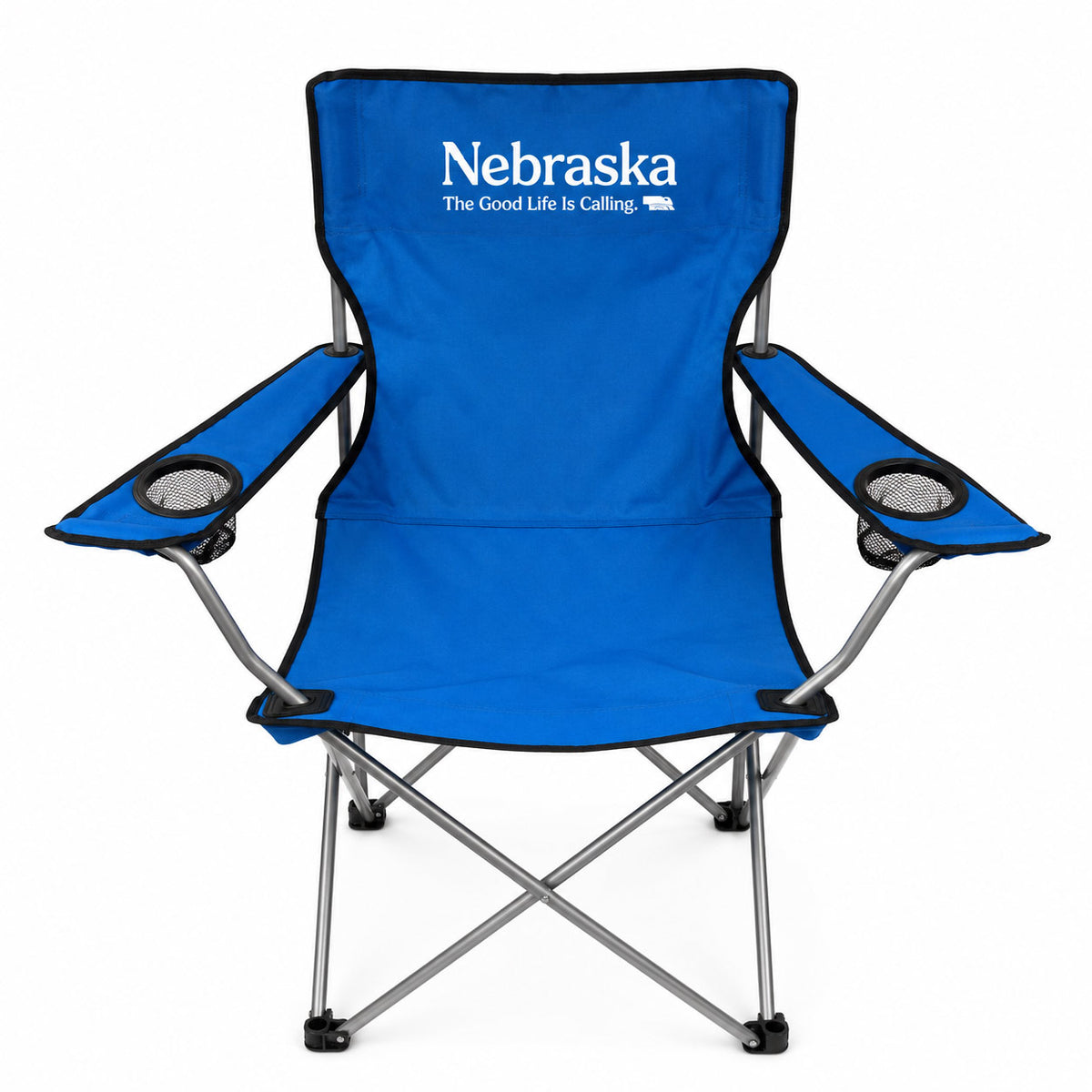A blue folding camp chair with a silver metal frame, featuring the white Nebraska text and slogan 'The Good Life Is Calling' printed on the backrest. The chair has black mesh cup holders on both armrests and black plastic feet, shown against a plain white background.