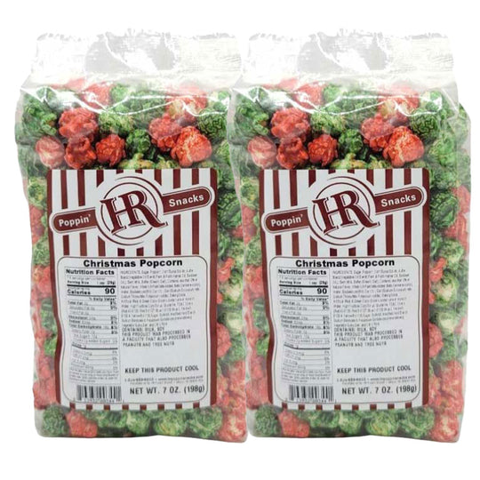 Two bags of HR Poppin' Snacks Christmas Popcorn on a white background