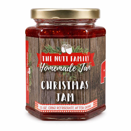 Jar of Christmas Jam with a wooden label on a white background