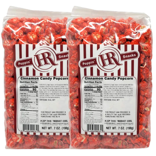 Two packages of HR Poppin' Snacks Cinnamon Candy Popcorn with labels.