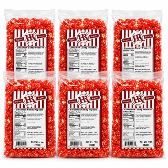 Six clear plastic bags of RR Brand Cinnamon Candy Popcorn arranged in a 2x3 grid on a white background. Each bag contains bright red popcorn coated with cinnamon and sugar, with a white and red striped label showing product details.