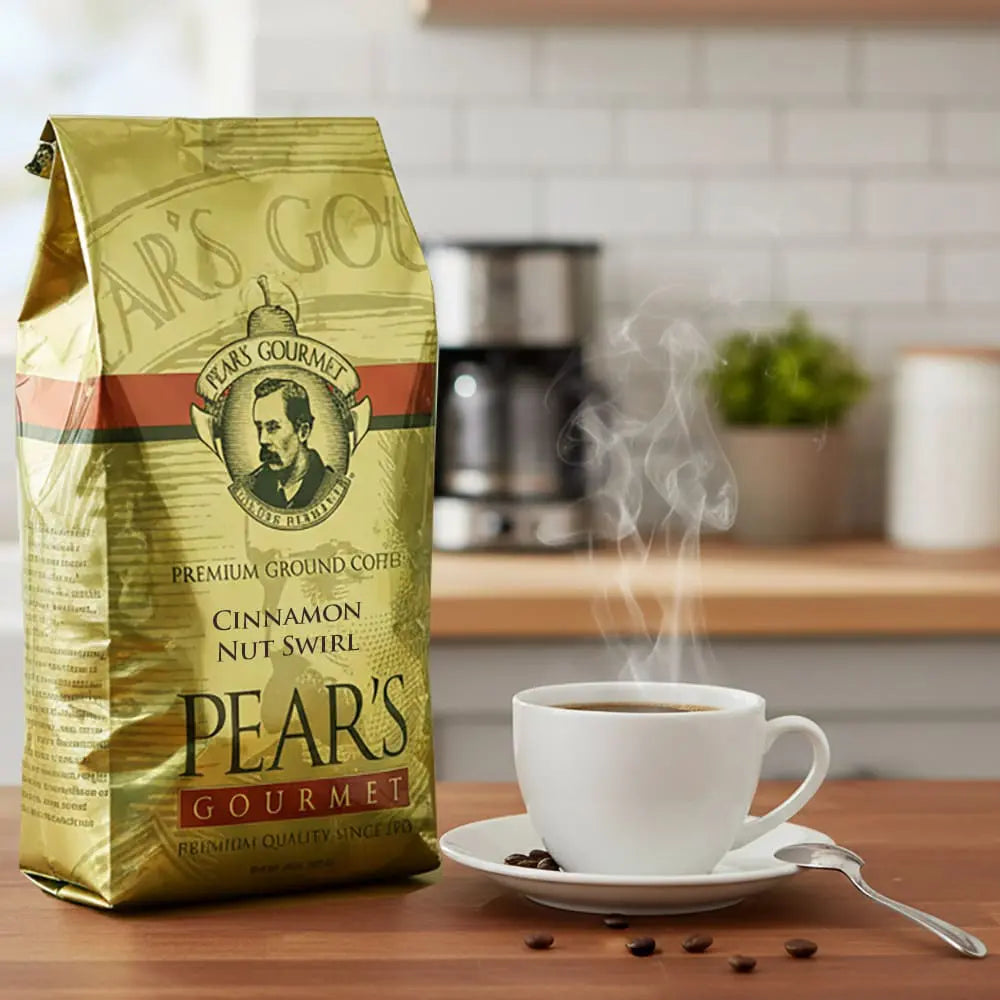 Pear's Gourmet coffee bag with a steaming cup of coffee on a wooden table.