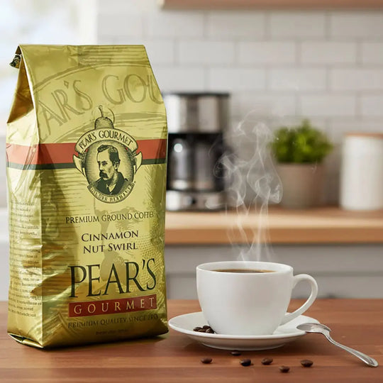 Pear's Gourmet coffee bag with a steaming cup of coffee on a wooden table.