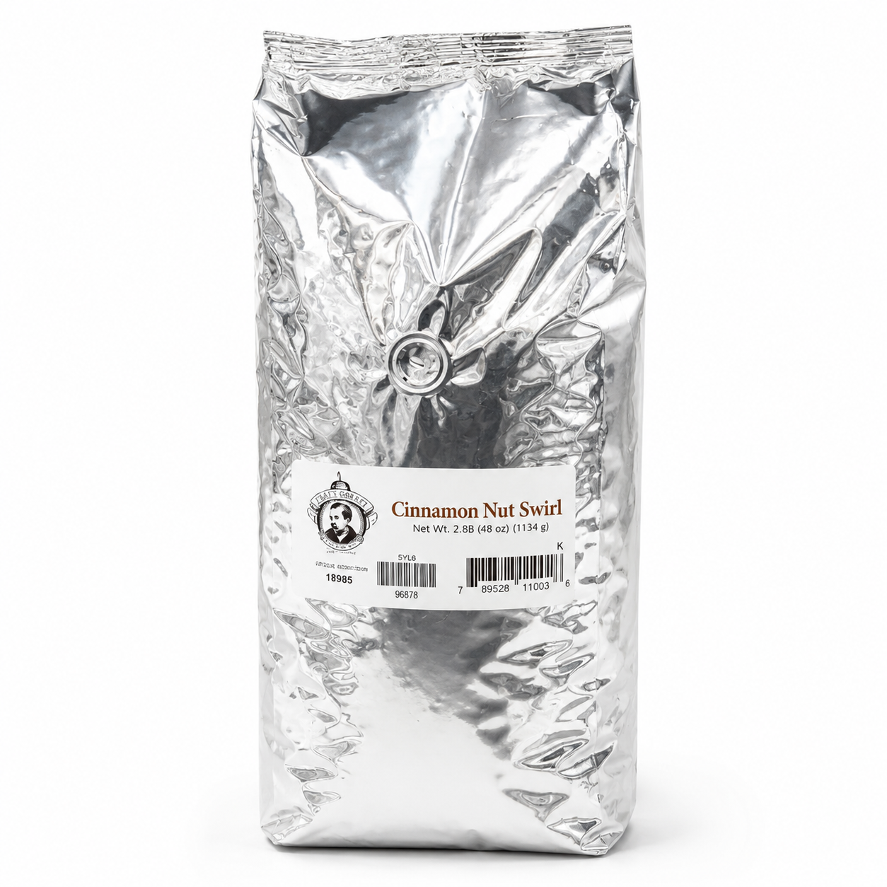 Silver bag of cinnamon nut swirl coffee on a white background