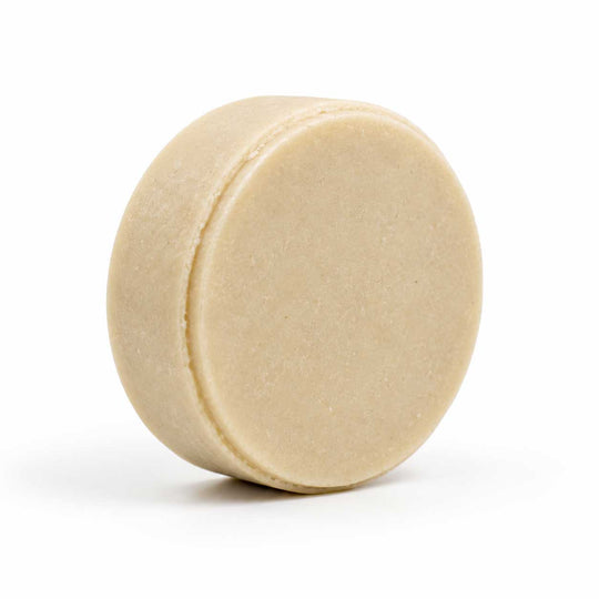 Beige circular object on a white background