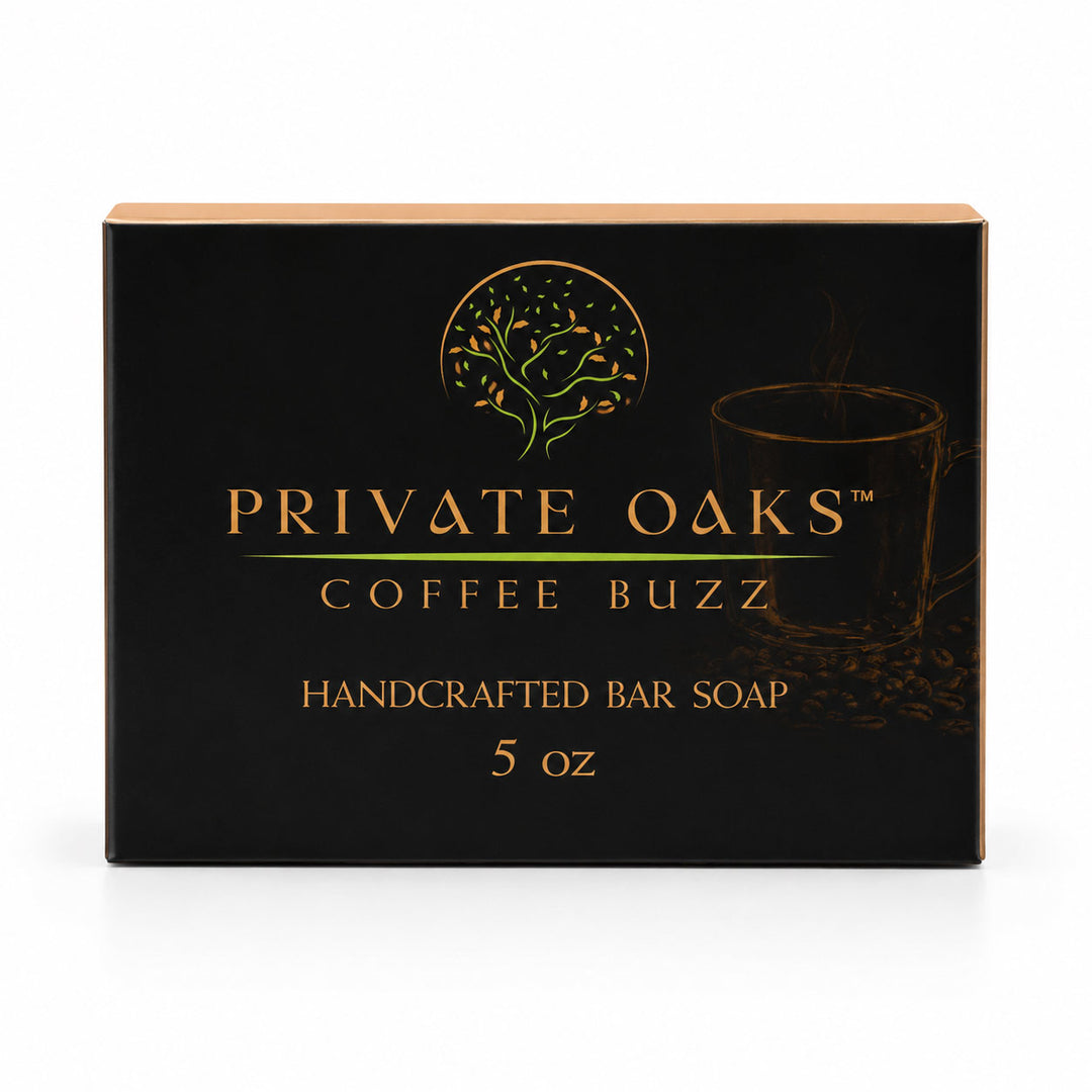 A rectangular black box of Private Oaks Coffee Buzz Handcrafted Bar Soap, 5 oz, featuring gold lettering and a tree logo on a white background.