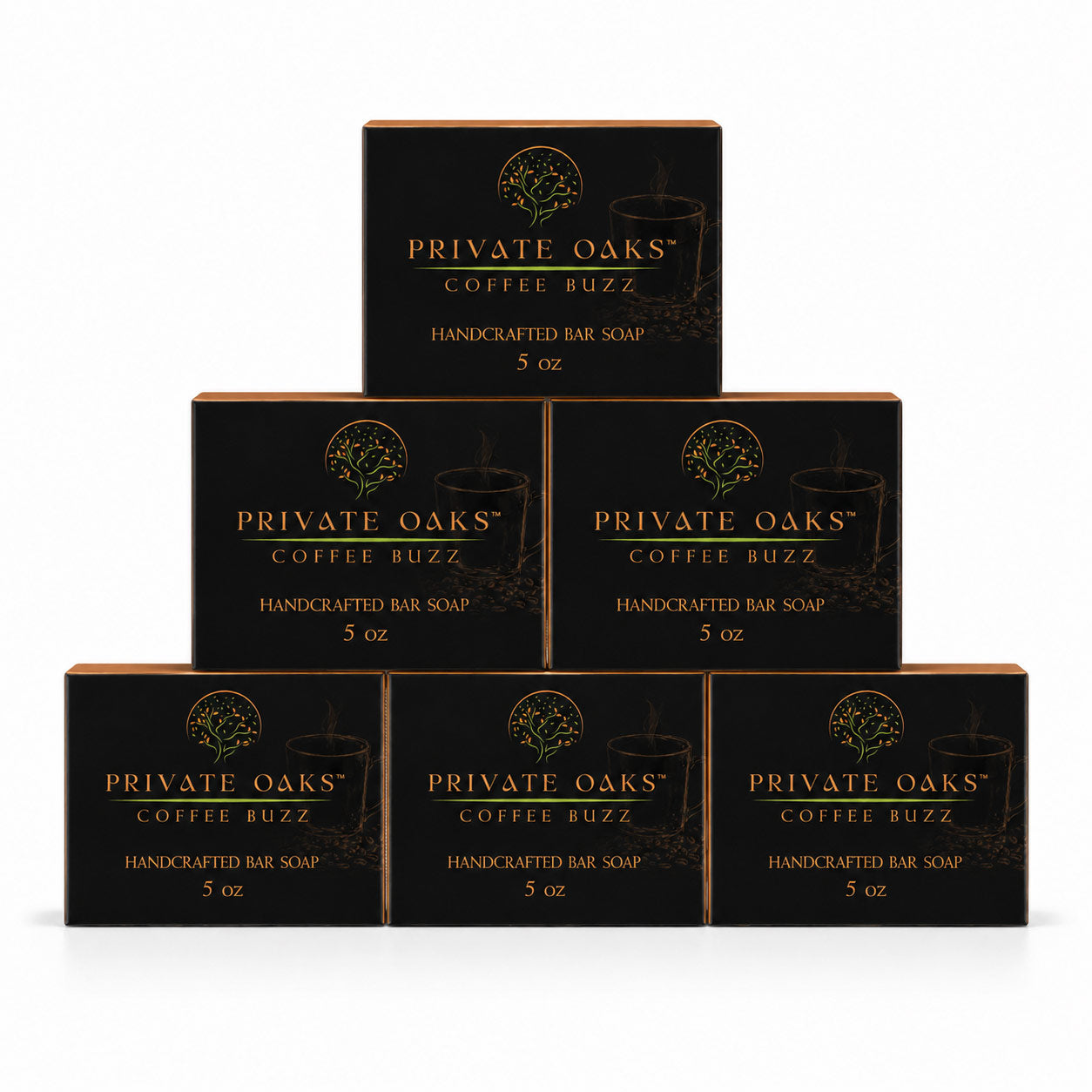 Six black boxes of Private Oaks Coffee Buzz Handcrafted Bar Soap arranged in a pyramid stack on a white background.