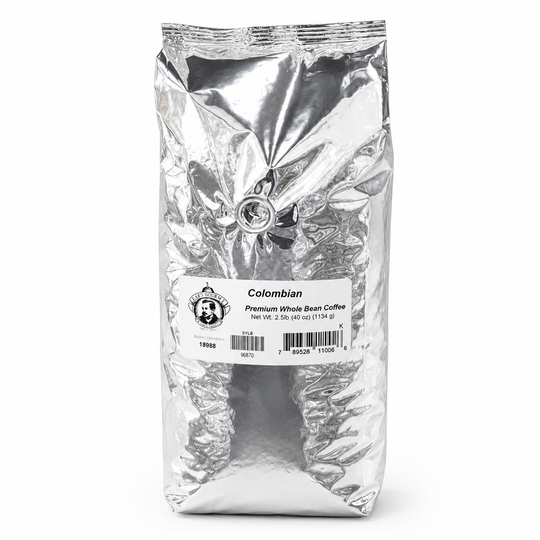 Silver-wrapped coffee package with a label on a white background