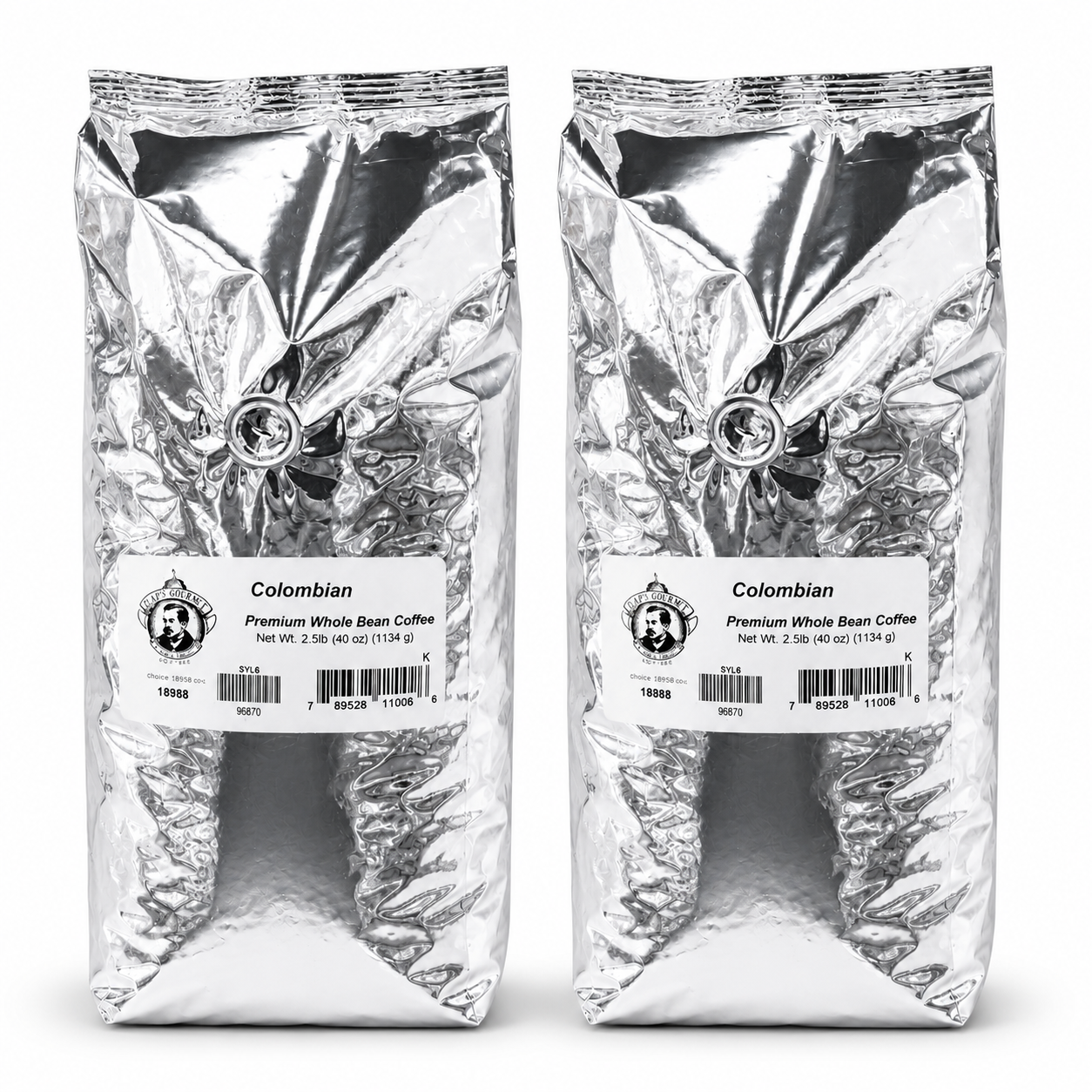 Two packages of Colombian Premium Whole Bean Coffee on a white background