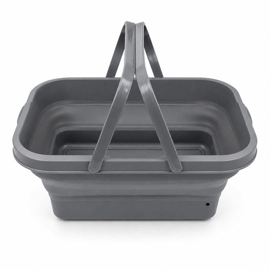 A dark gray collapsible plastic laundry basket with integrated handles, shown on a clean white background.