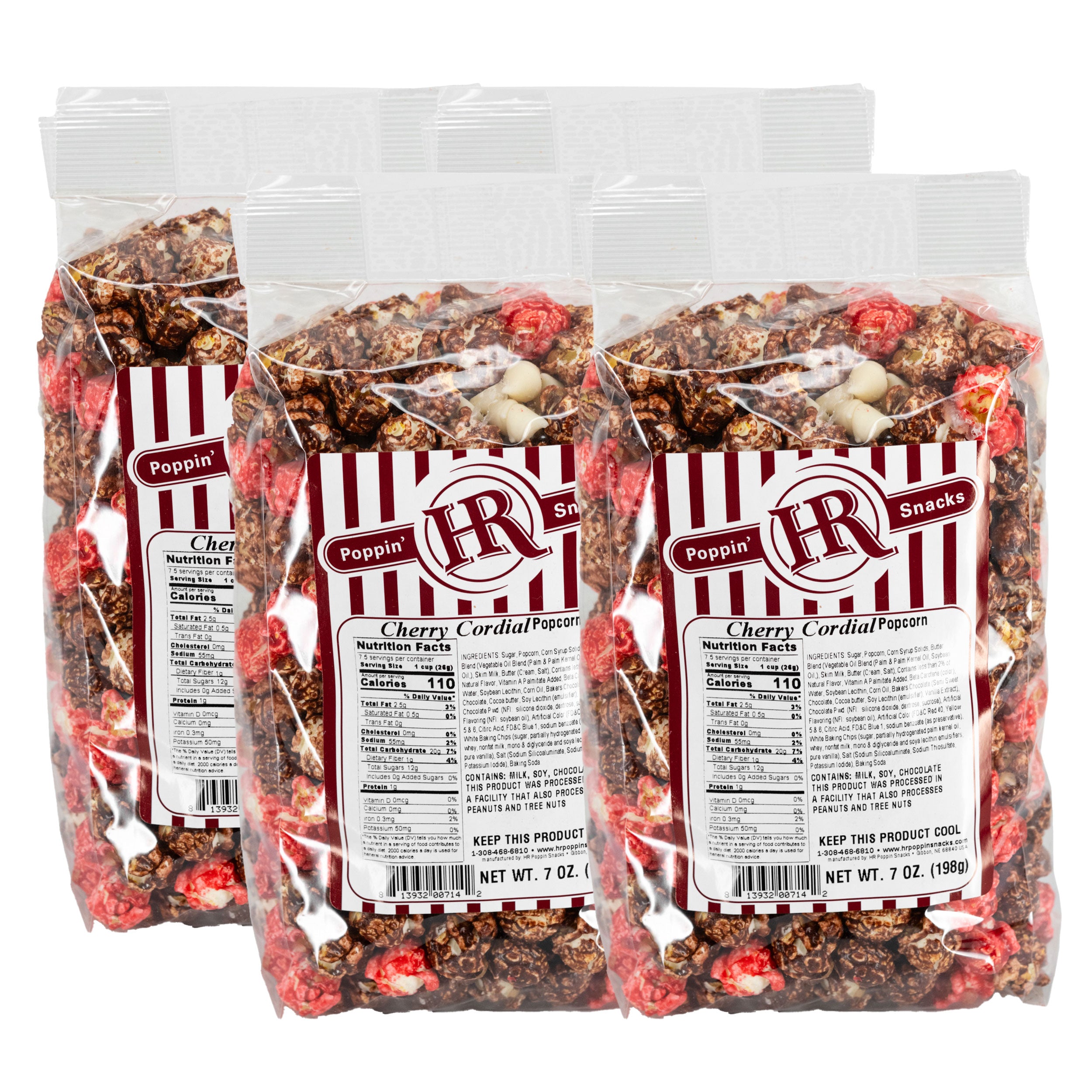 Four packages of Cherry Cordial Popcorn with visible branding and nutritional information.