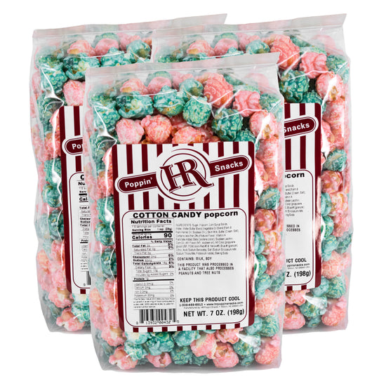 Packaged cotton candy popcorn with a visible brand label on a white background