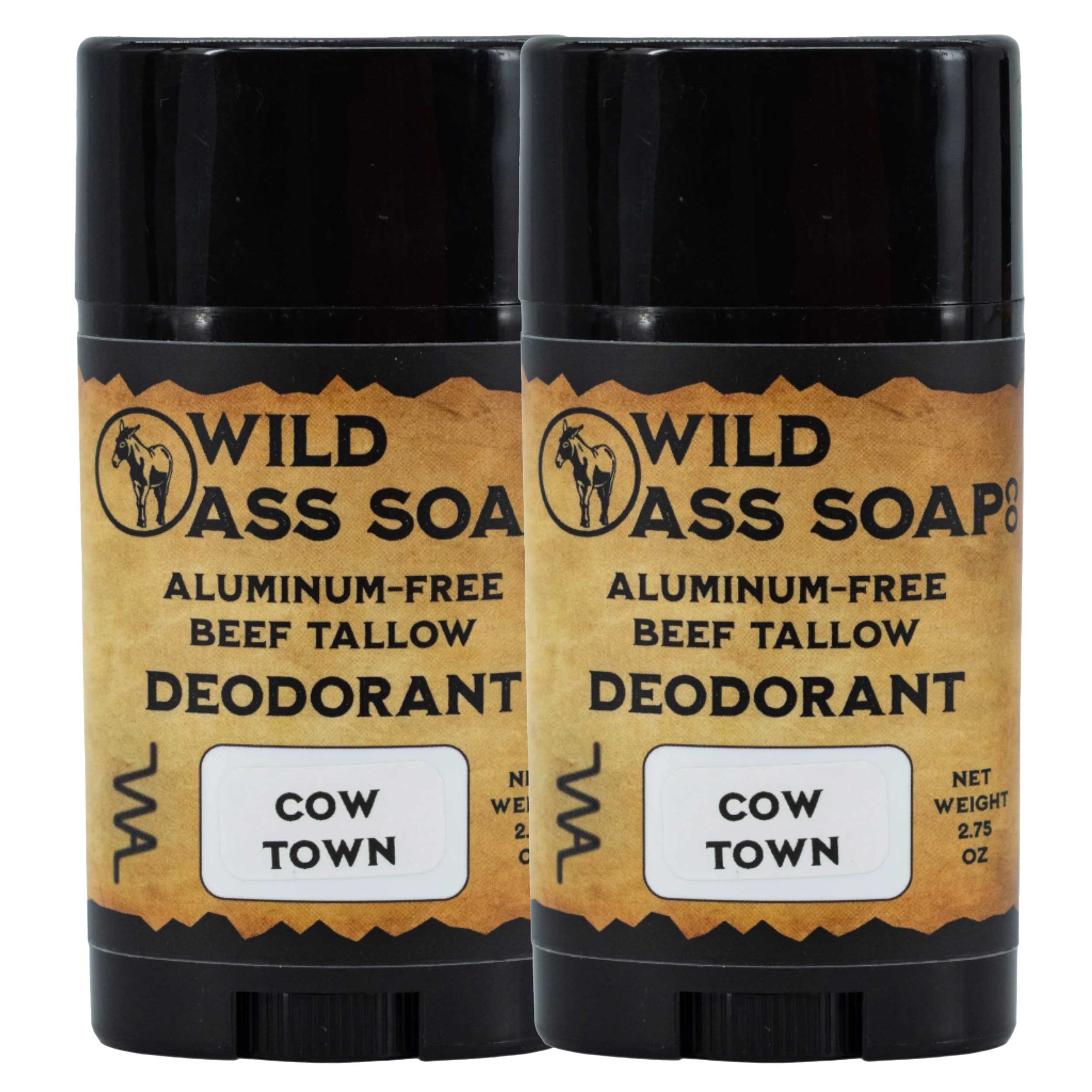 Two sticks of Wild Ass Soap deodorant labeled 'Cow Town' on a white background.
