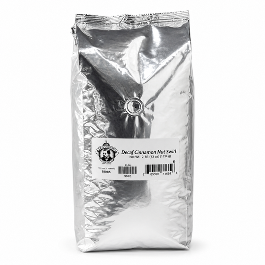 Silver foil coffee bag with a label on a white background