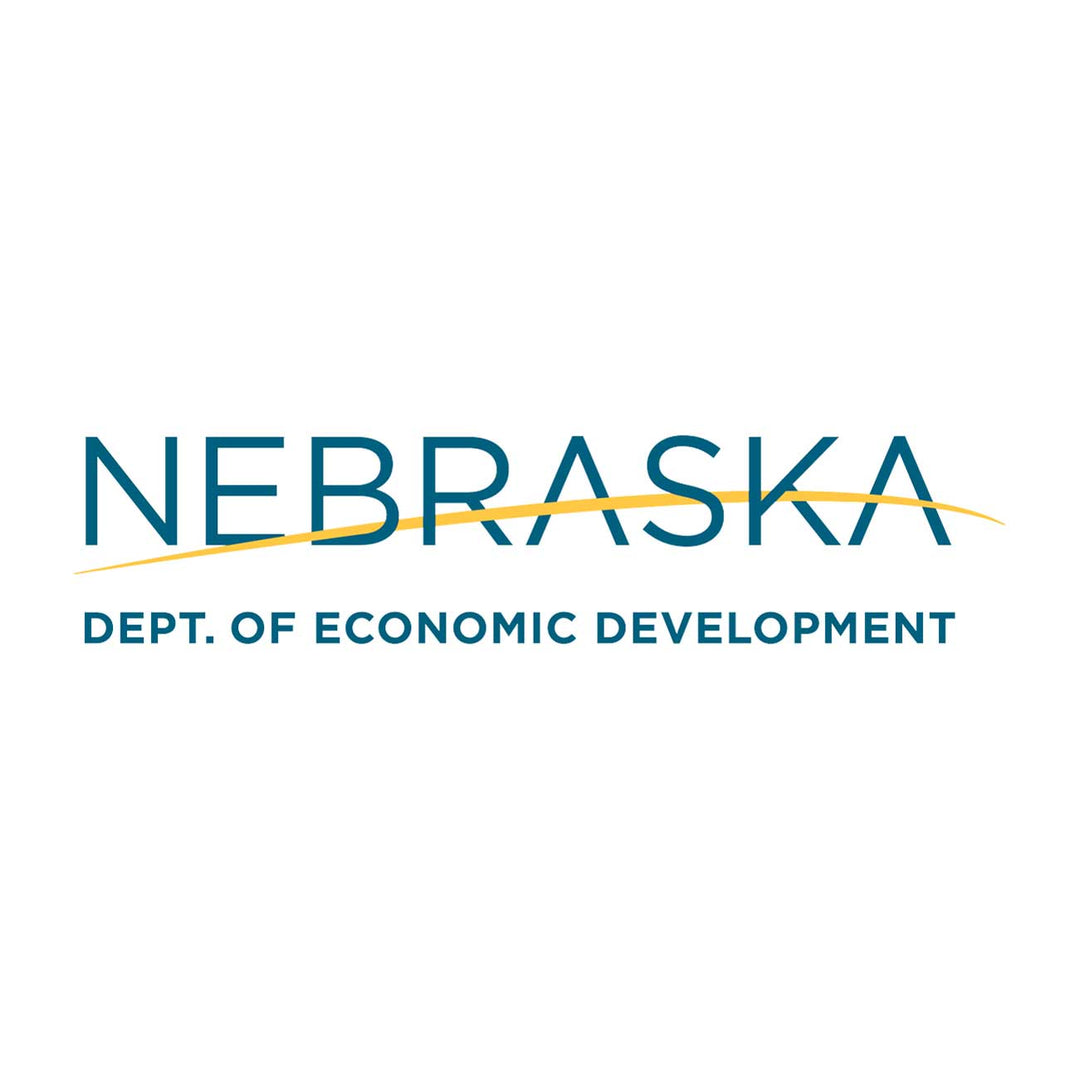 The logo for the Nebraska Department of Economic Development, featuring the word 'NEBRASKA' in teal with a yellow swoosh line and the text 'DEPT. OF ECONOMIC DEVELOPMENT' below on a white background.