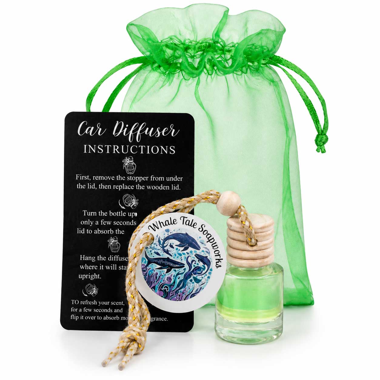 Car diffuser with whale design, bottle, and green drawstring bag on a white background