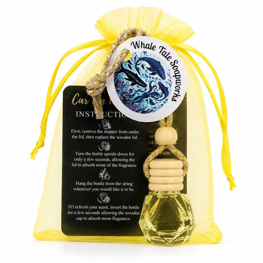 Car air freshener with whale design and instructions on a white background