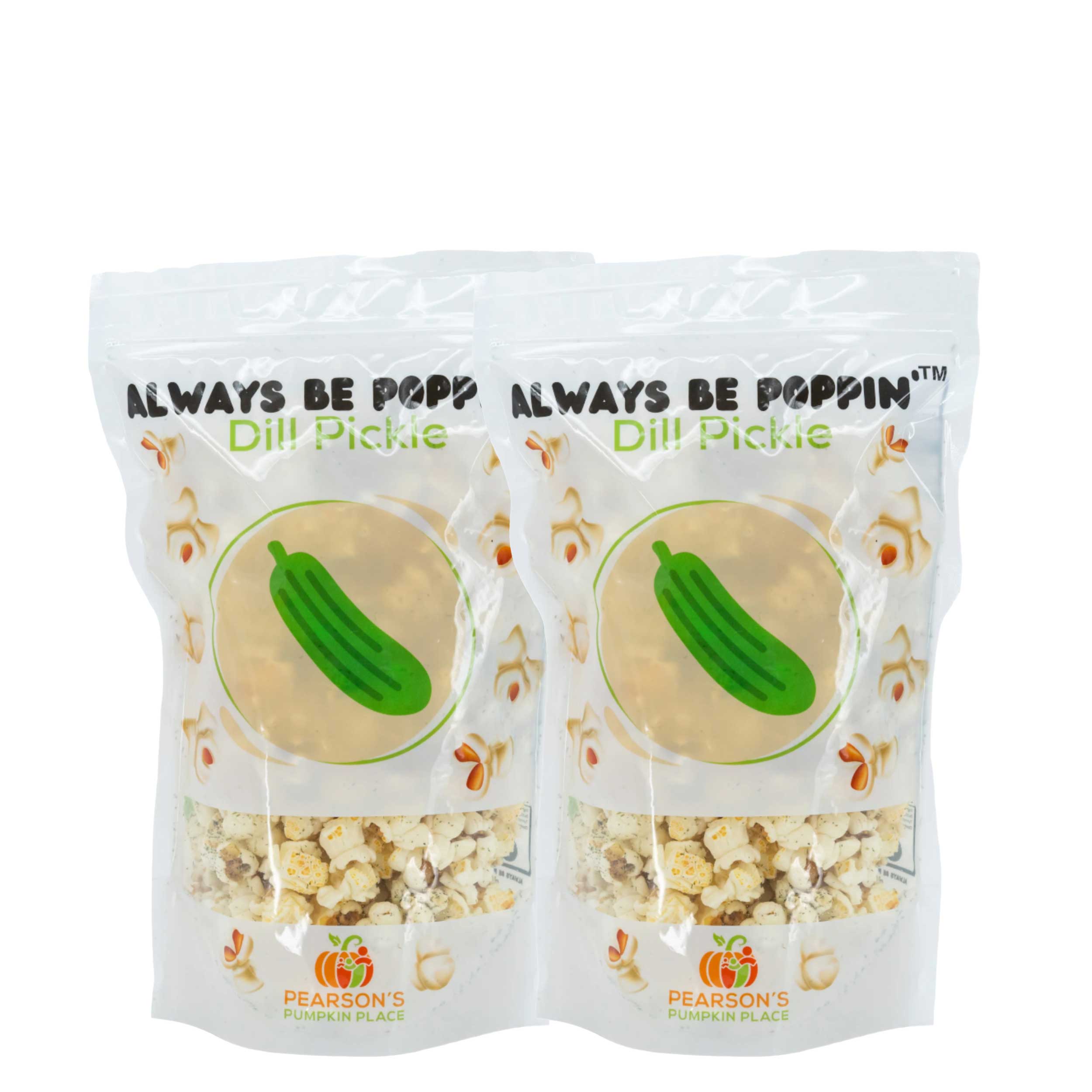 Two packages of Pearson's Dill Pickle popcorn on a white background