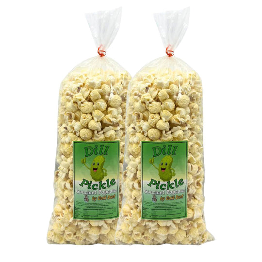 Two bags of Dill Pickle Gourmet Popcorn with green labels on a white background