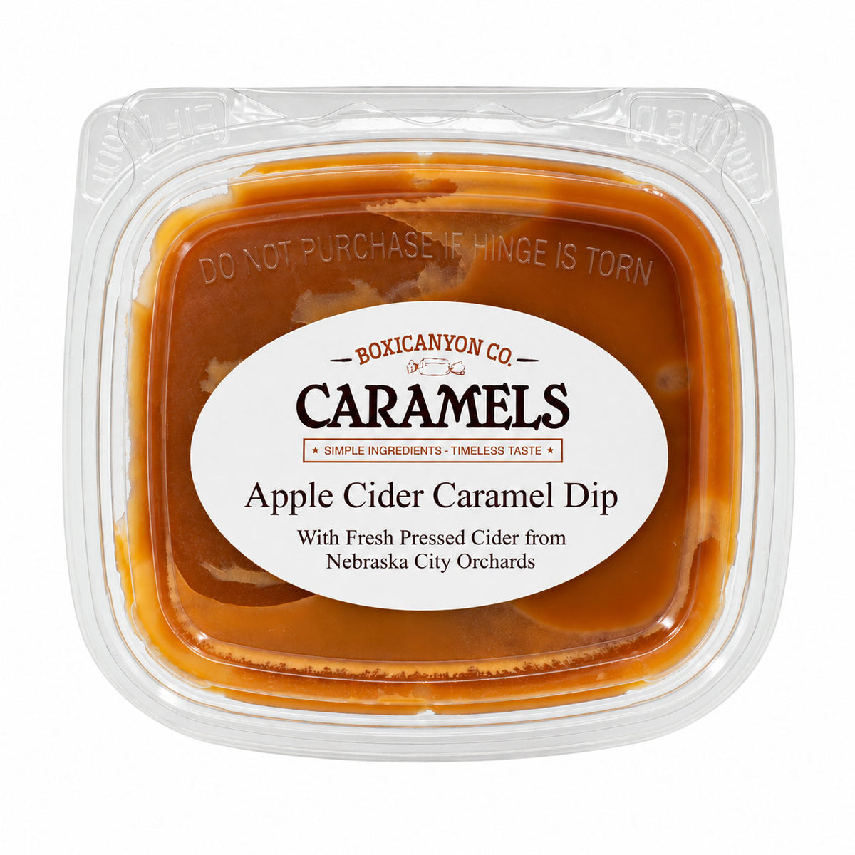 Boxicanyon Co. Apple Cider Caramel Dip in a clear plastic tub with a white oval label, photographed on a white background.