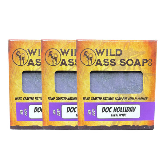 Three bars of Wild Ass Soap with 'Doc Holiday' label on a white background