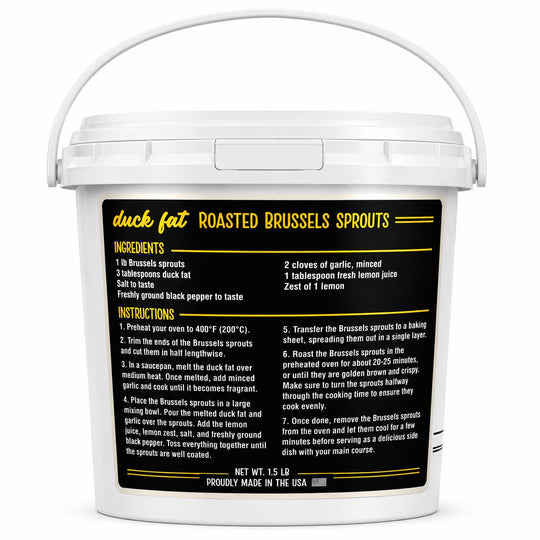 A white plastic bucket with a handle, featuring a large black label with yellow and white text detailing the ingredients and instructions for making duck fat roasted Brussels sprouts.