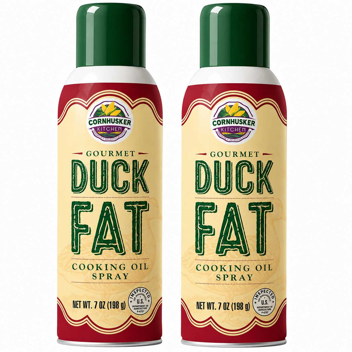 Two 7 oz cans of Cornhusker Cooked Gourmet Duck Fat Cooking Oil Spray side by side on a white background.