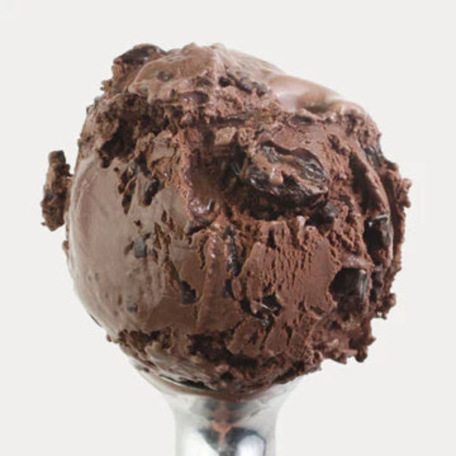 A scoop of Chocolate Chunk Ice Cream on a white background