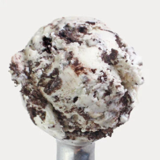 A scoop of Cookies and Cream Ice Cream on a white background